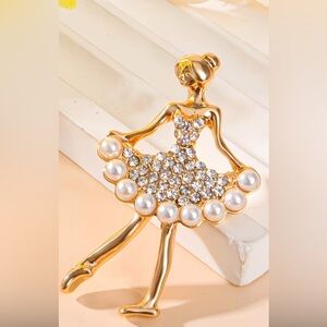 Elegant Gold and Pearl Ballerina Pendant